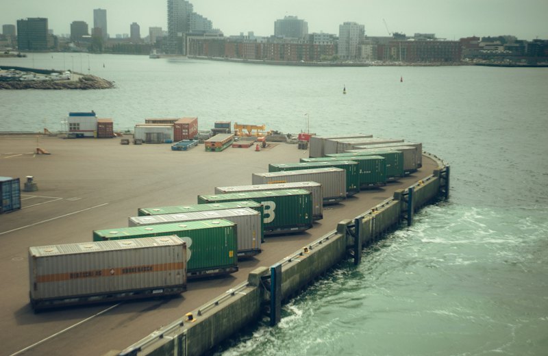 Shipping containers lined up at a European port