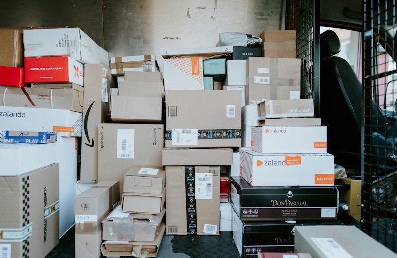 Stacked parcels with shipping labels ready for dispatch
